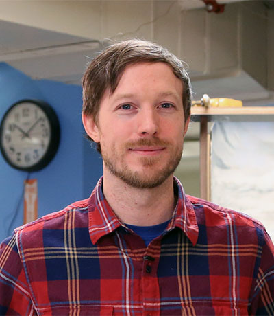 Headshot of Aaron Delehanty.