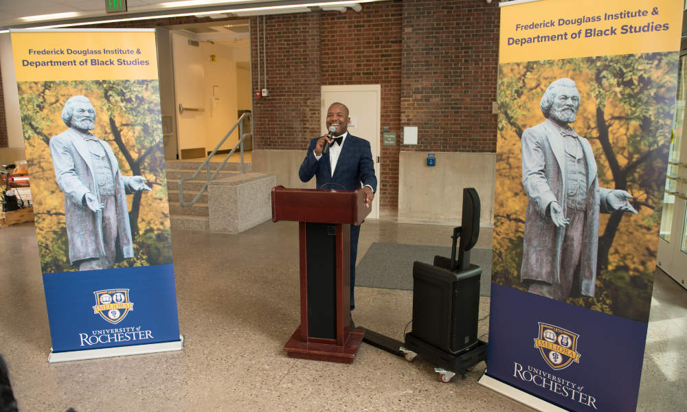 Director Jeffrey McCune giving a speech at a podium.