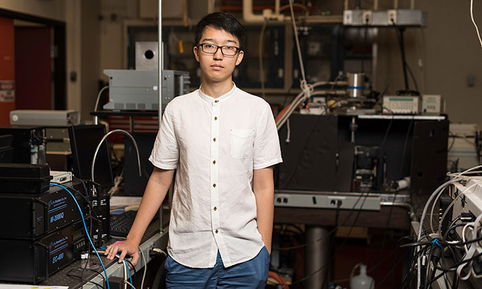 Tianhao Yu ’19 in the Hutchison Hall lab of chemistry professor Lewis Rothberg. Yu is using lasers to study films of organic light emitters. (University photo / J. Adam Fenster)