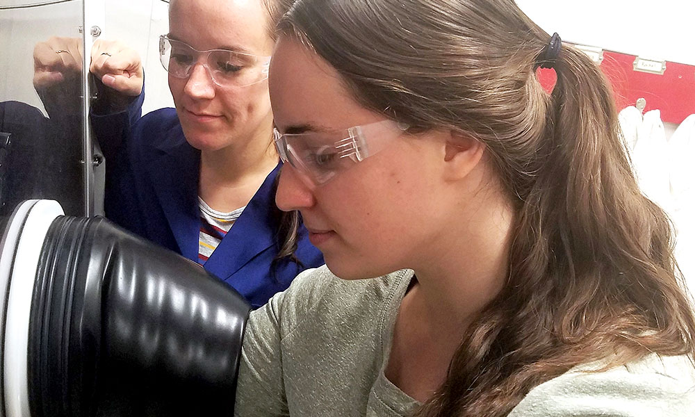 Ellen Matson and Lauren VanGelder at work in Matson's lab