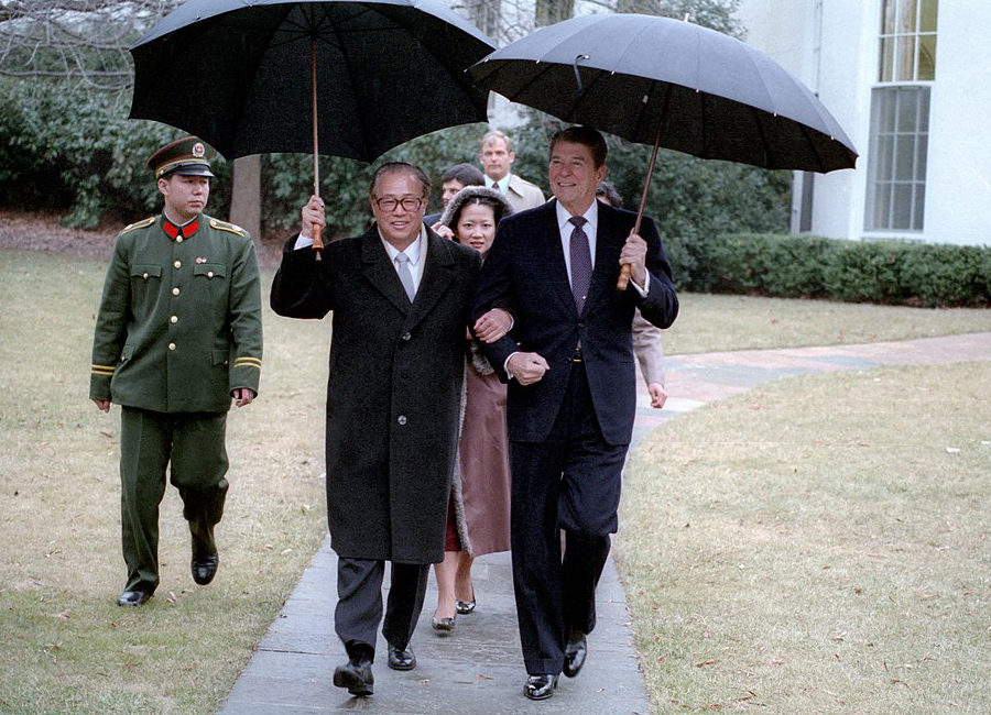 President Ronald Reagan walking with Premier Zhao Ziyang outside the White House.
