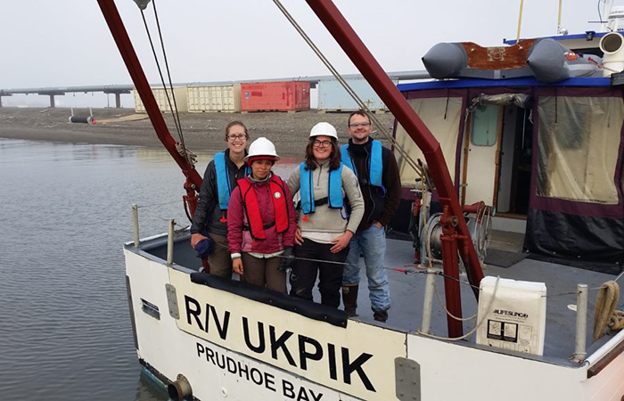 From left to right: Kathryn Schreiner, assistant professor of chemistry and biochemistry (Univ. of Minnesota Duluth); PhD candidate Fenix Garcia-Tigreros (UR); Sparrow; and Kessler, associate professor of earth and environmental sciences, aboard the research vessel in Prudhoe Bay, Alaska. (University of Rochester photo / John Kessler)