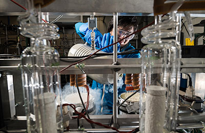 A student working on an experiment in a lab.