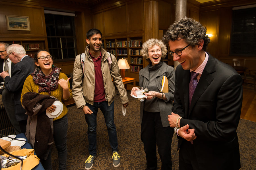 Students and faculty share a laugh at a reception after the annual Philip S. Bernstein lecture.