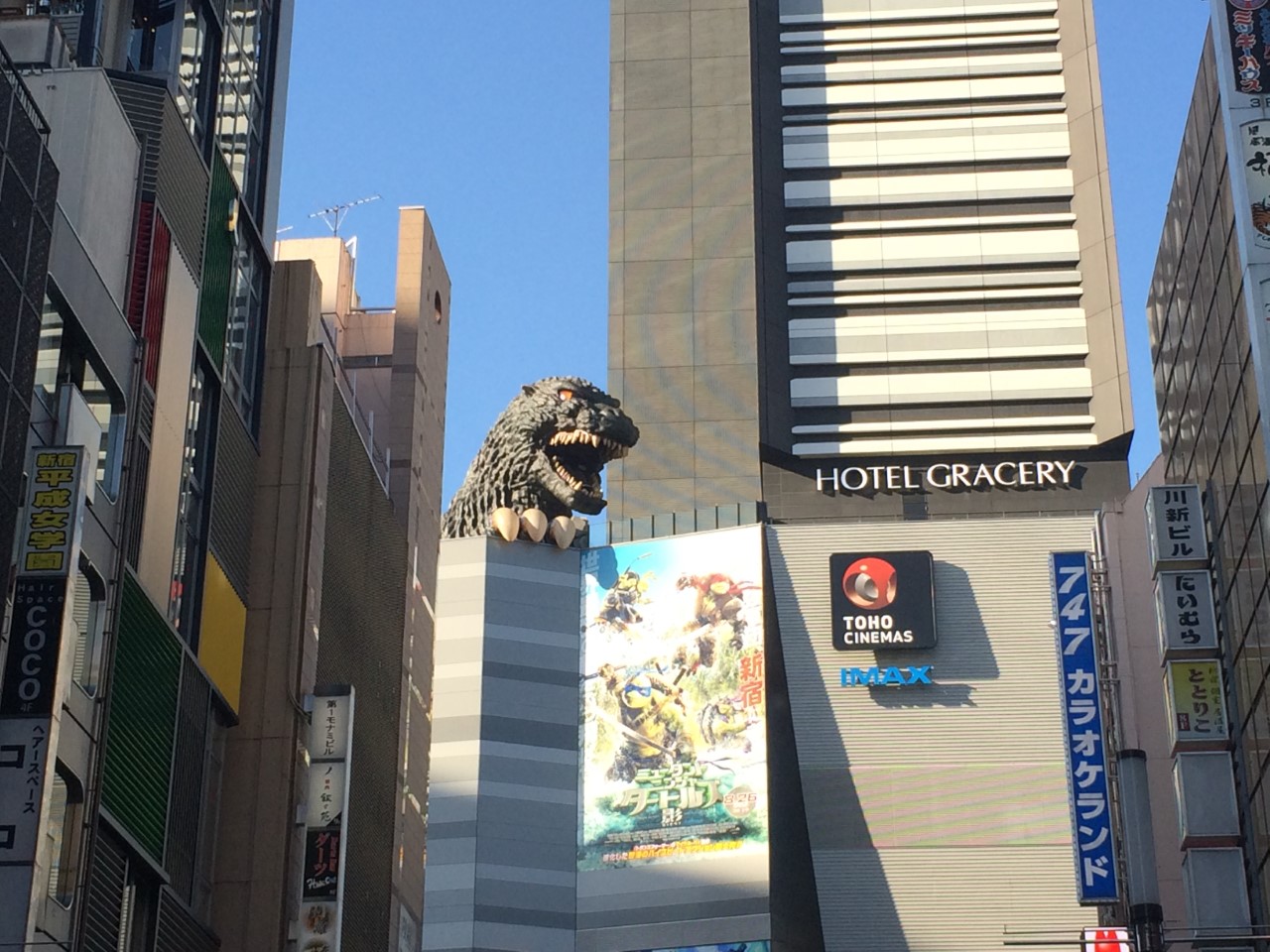 okyo Godzilla figure atop the Toho Cinema.