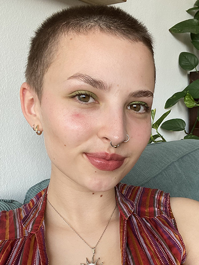 Headshot of Kira.