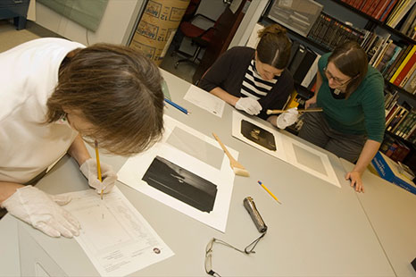 Students working in archives