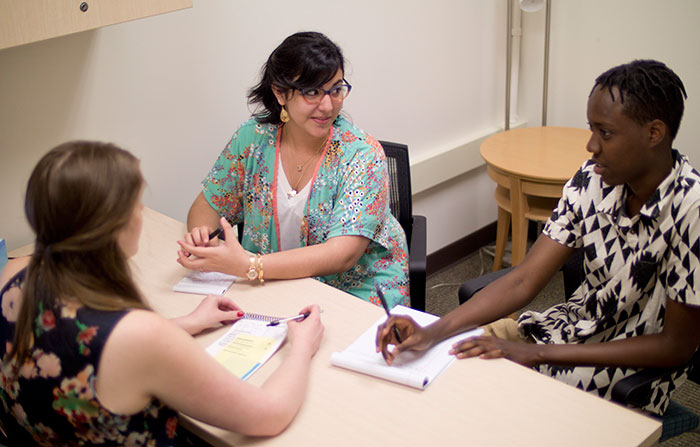 Student working at a table.