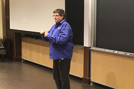 ASL Instructor in front of a class.