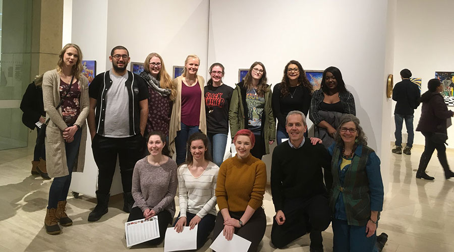 Students at an ASL art installation in NTID.