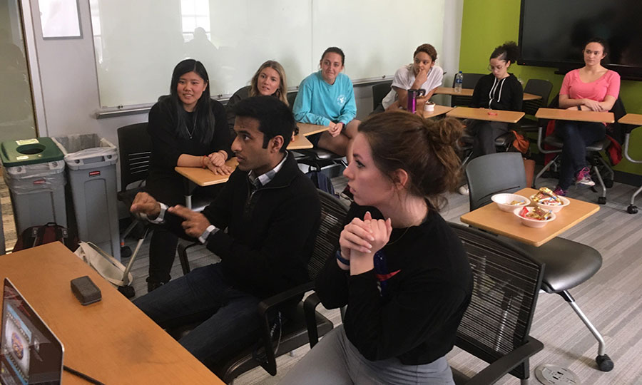 Students in class playing the Family Feud game.