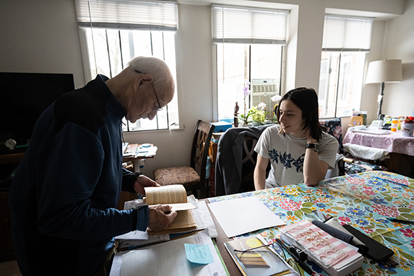 A student interviews a local russian-speaking native for research.