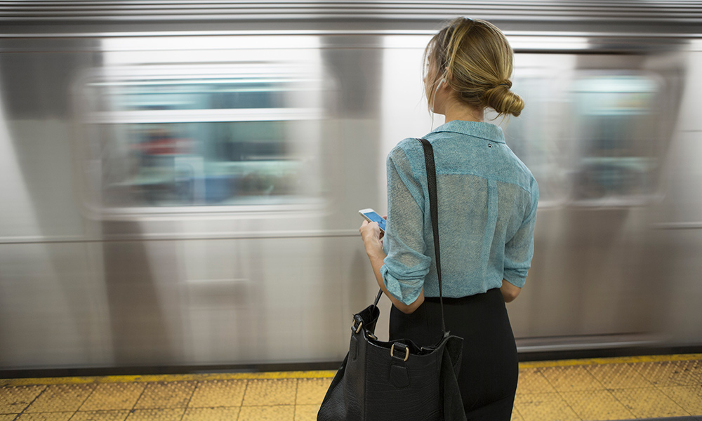 Woman waiting for train