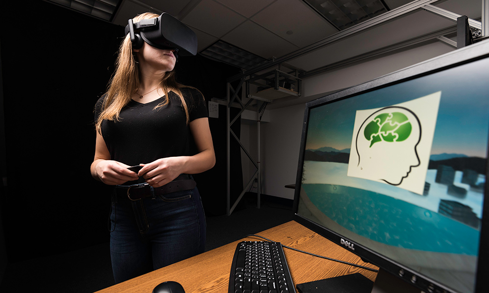 Brenna James '20, a member of the women's basketball team, suffered a concussion in high school. Rochester researchers are using virtual reality to study how concussed patients' eyes track and move across the visual field. The goal is to create therapeutic treatments that can be used at home by patients. 