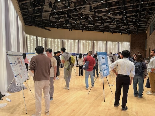 students presenting posters