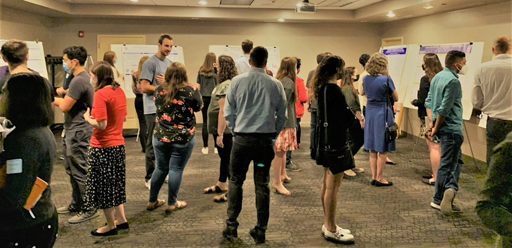 Attendees at the retreat poster session.