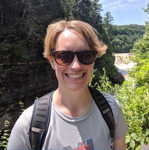 Shauna Paradine with a river gorge in the background.