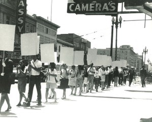 Marchers from the originally 1962 event holding blank placards.