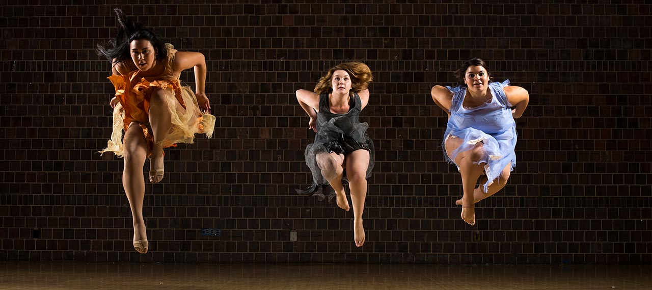 Three women in dance.