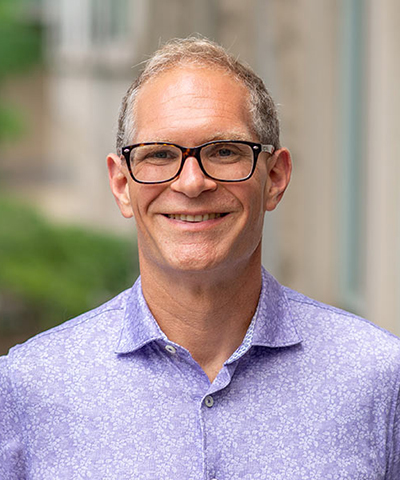 Headshot of David Figlio.