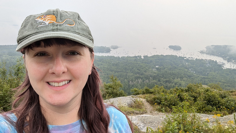 Sara Williams in a rocky marsh.