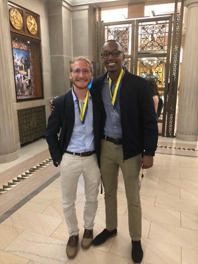Stuart and Derrick standing together
