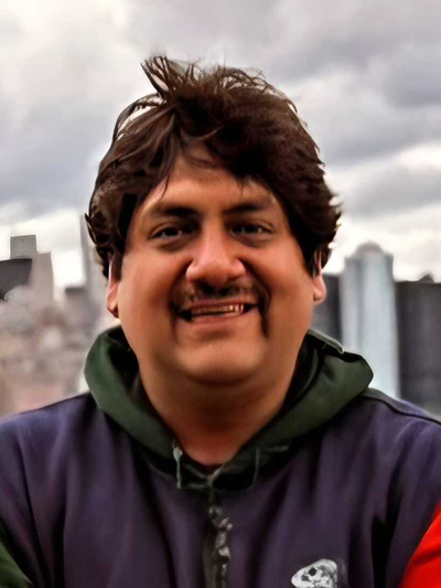 Headshot of David Cúñez.