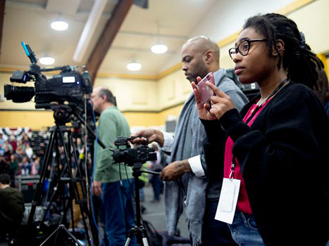 Alexandria Brown recording a video.