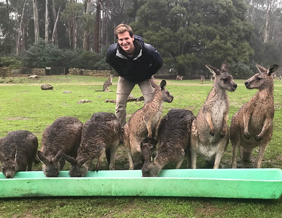 Kyle Criscitello with kangaroos.
