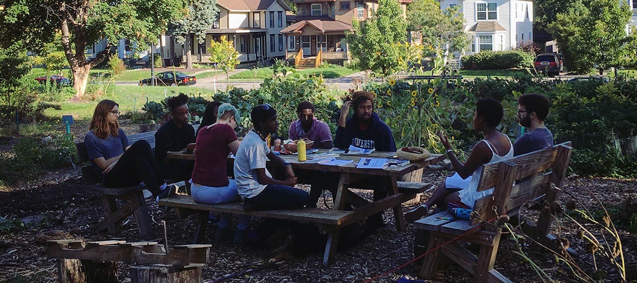 Students seeding a garden