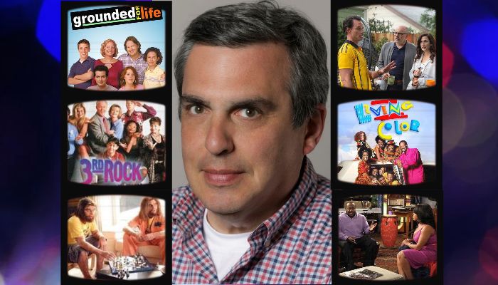 Alumnus Mike Schiff & TV screens 