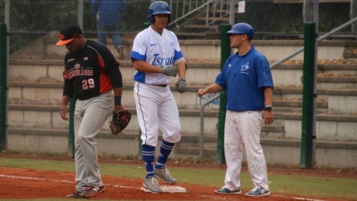 Mulberg (R) is seeing his passion for baseball and his Jewish heritage come together, coaching in this year's Olympic Games