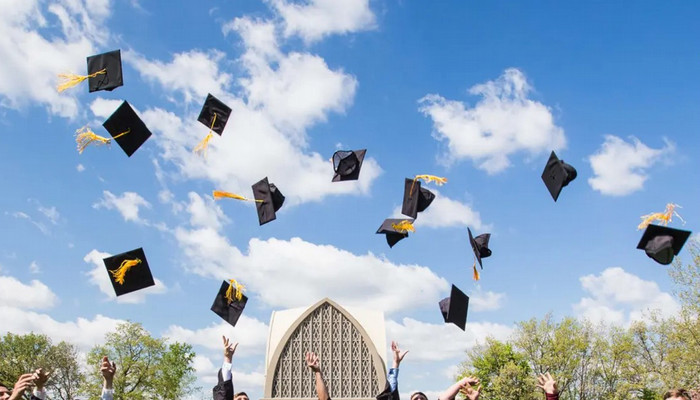 Graduation Caps in the Air