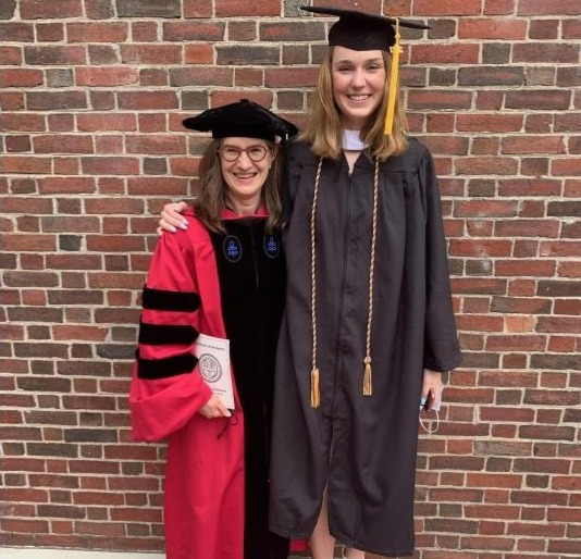 Dr. Laura Smoller standing with graduating student Alma Petras