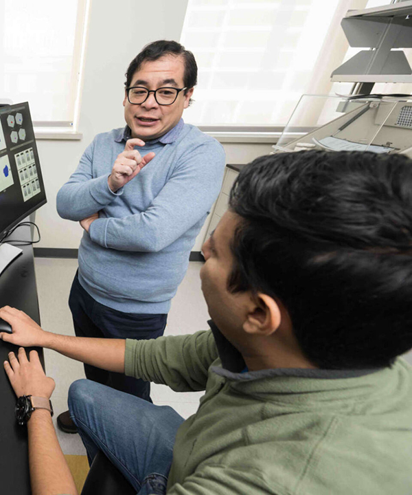 The professor working with a student.