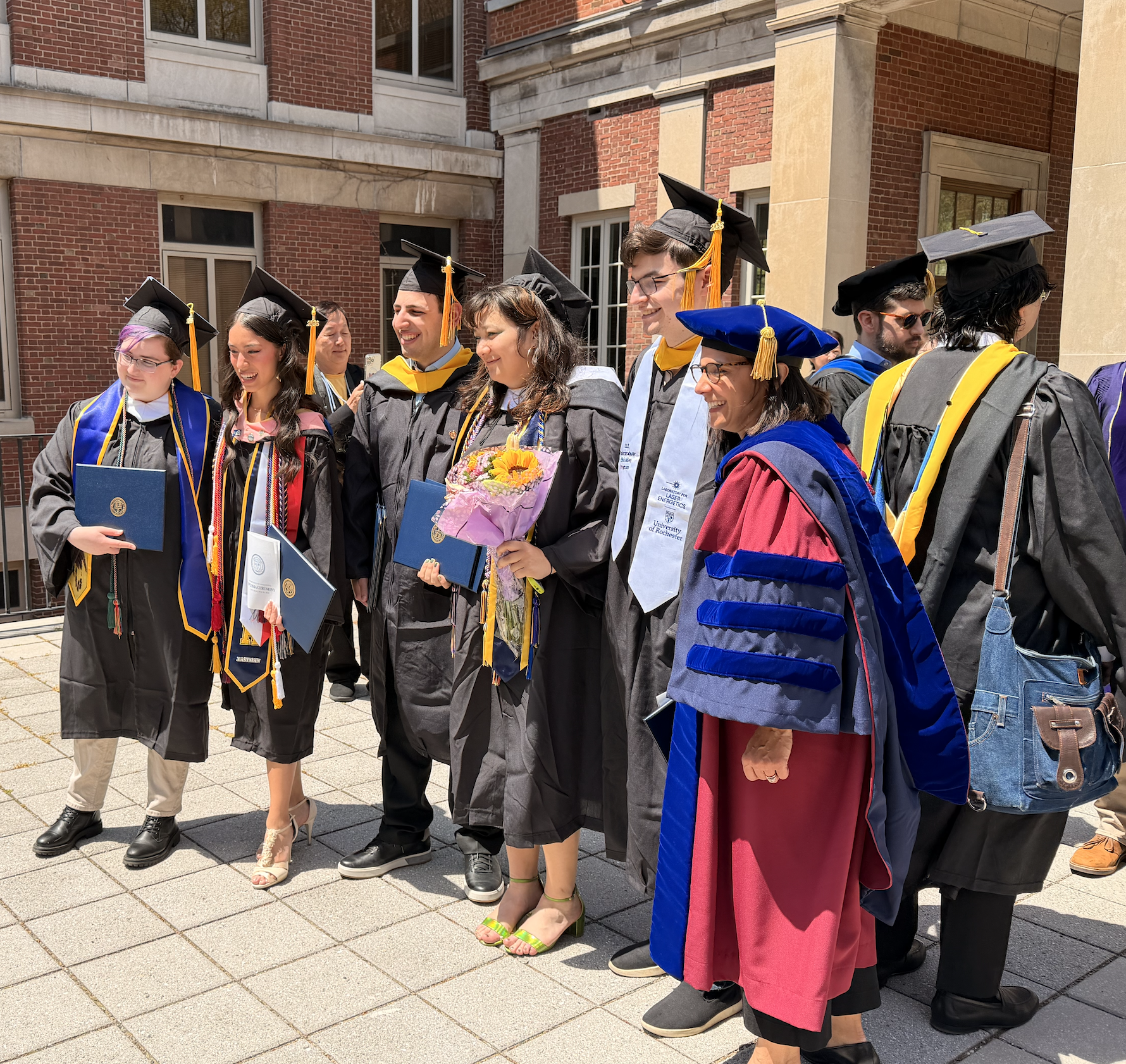 Graduating students with Professor Abtahian, 2026