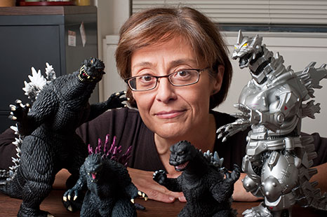 Joanne Bernardi with Godzilla models