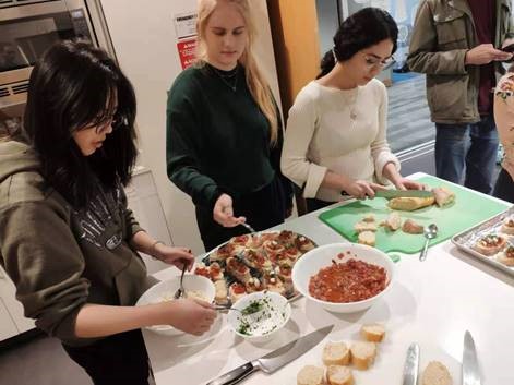 Students preparing food.