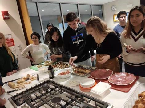 Students serving food.