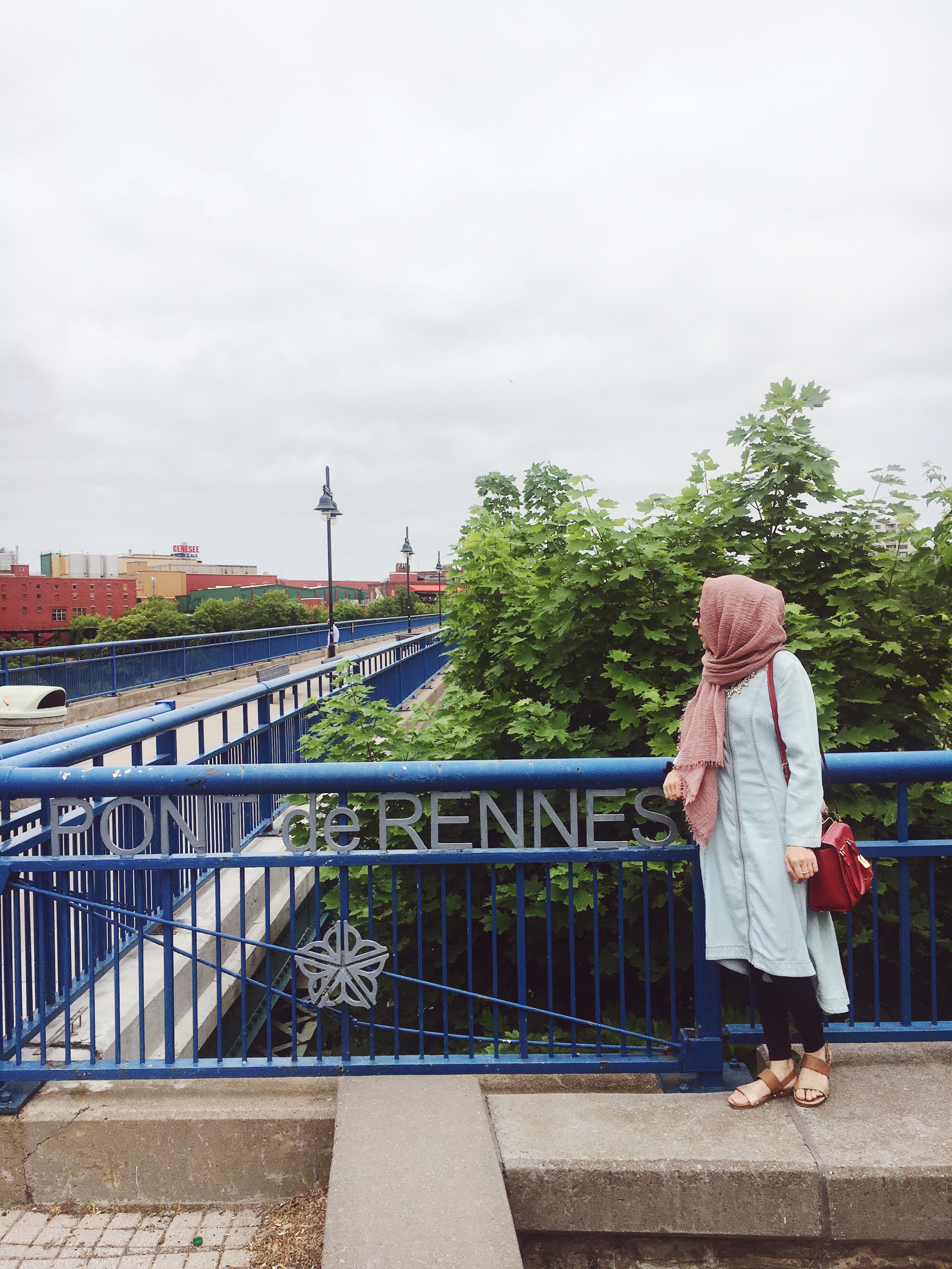 girl standing on pont de rennes bridge