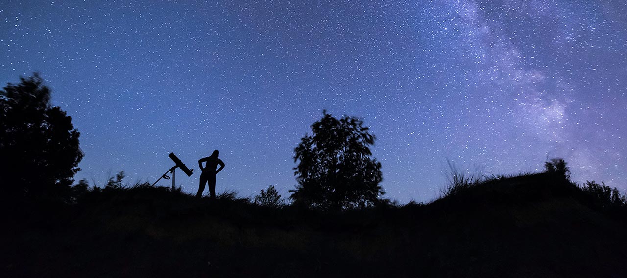 Stars and the Milky Way Galaxy are seen over Lake Ontario in the evening at Chimney Bluffs State Park in Wayne County, NY.