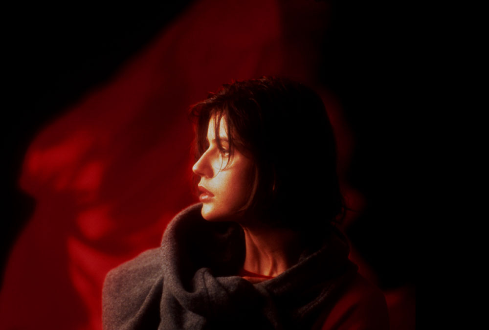 A still image from the movie of the side of a woman's face.