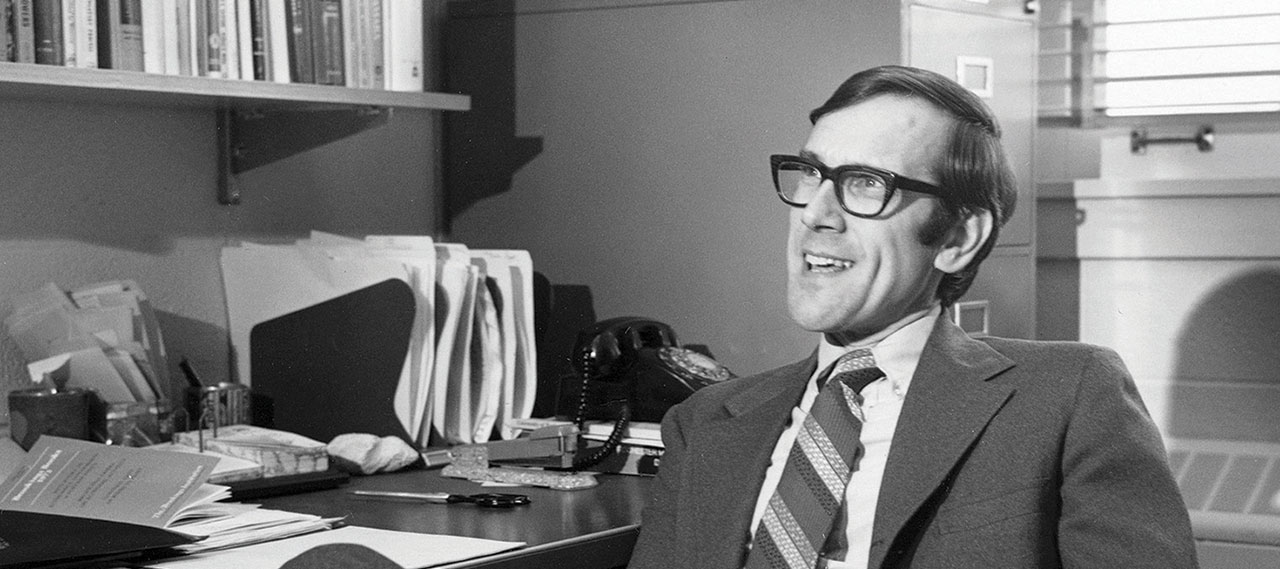 Richard Fenno sitting at his desk.