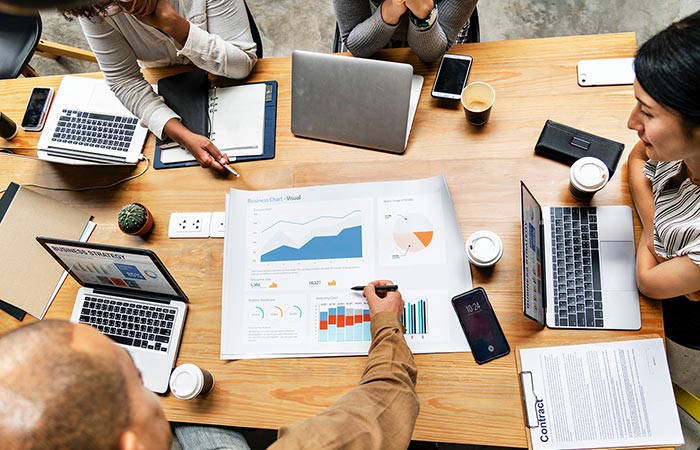 A group of people working in a meeting.